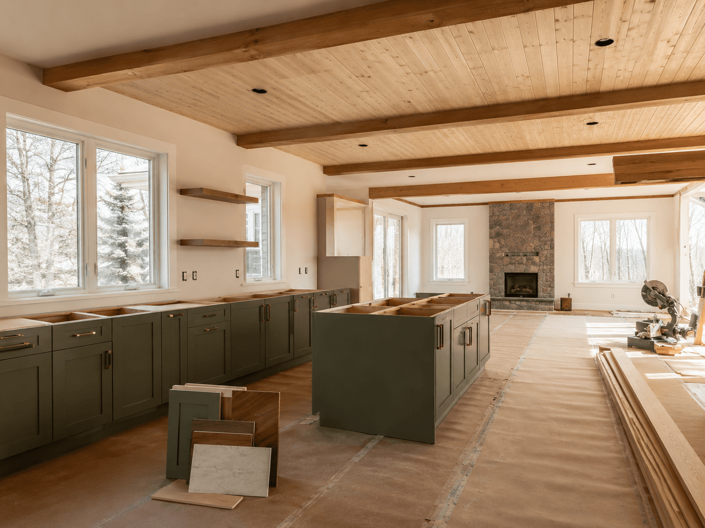 Kitchen renovation in progress with cabinetry and materials