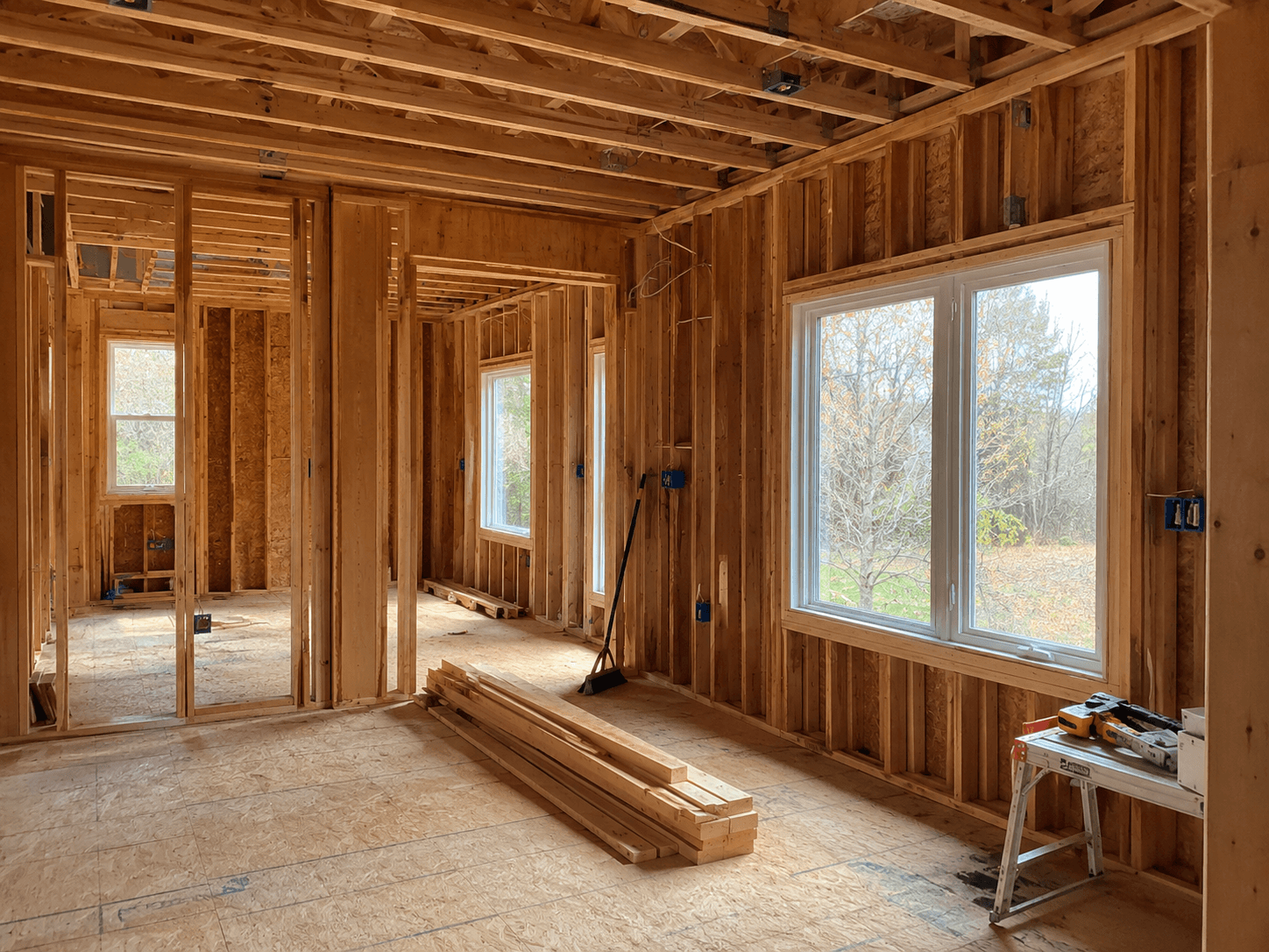 Early-stage custom home interior framing and windows