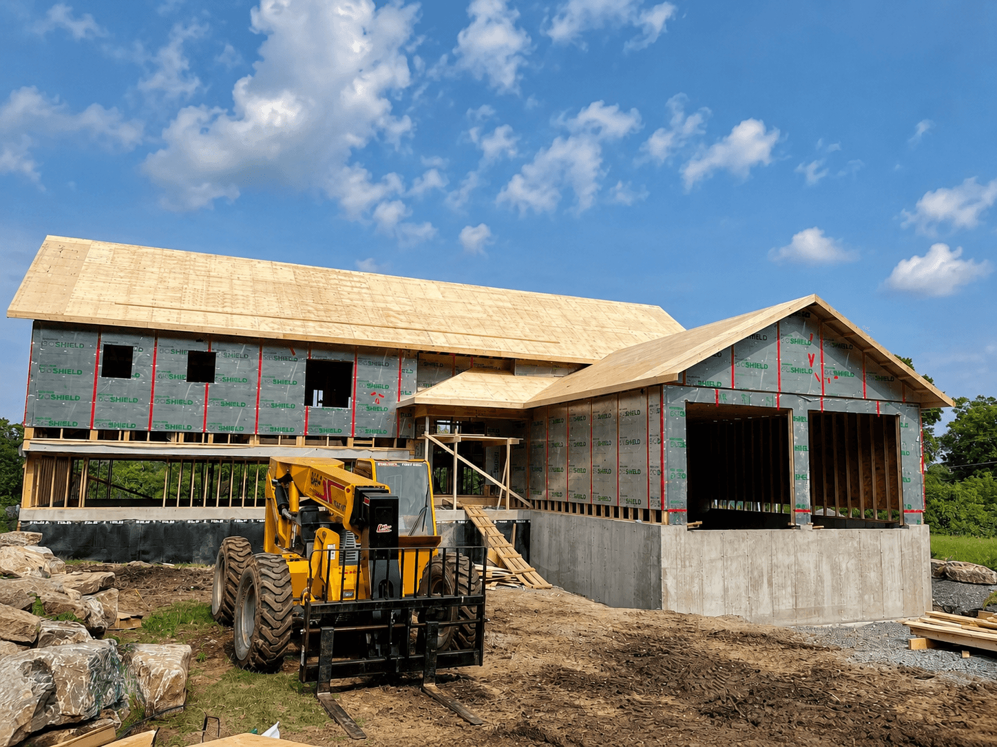 Large custom home under construction by Borrelli Crafters